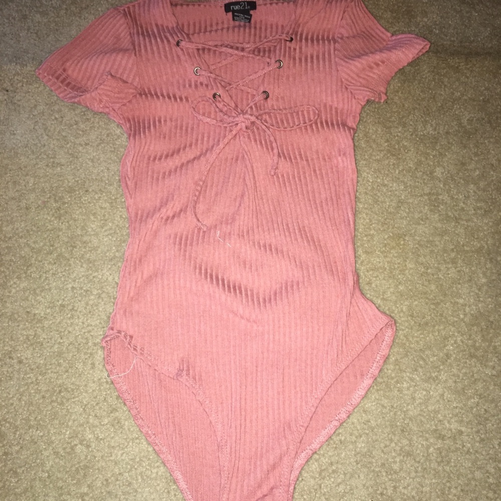 Pink body suit